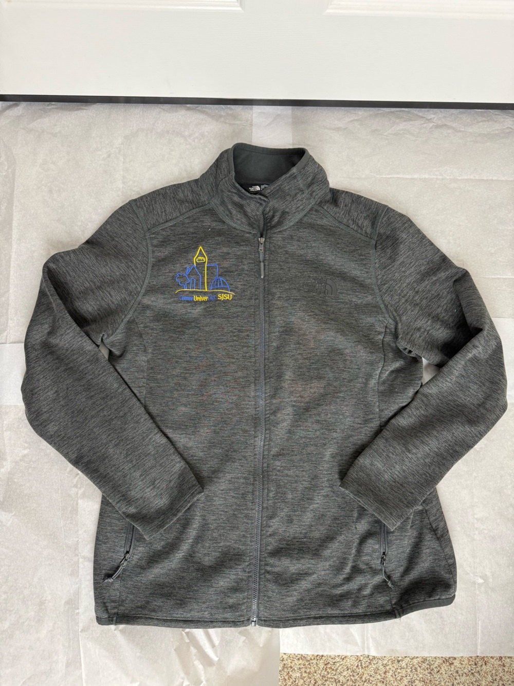 The North Face Dark Gray Full-Zip Jacket with Blue and Yellow Logo